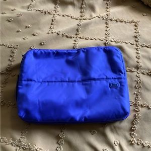 Lug Delta Mini tablet organizer bag in Violet